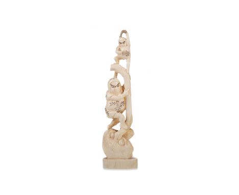 JAPANESE IVORY OKIMONO,Meiji Period (1868-1912), two folk creatures climbing tree trunk, two character signature to base,17.5