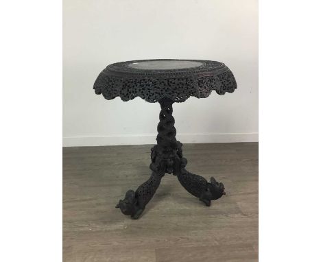 LATE 19TH CENTURY BURMESE HARDWOOD OCCASIONAL TABLE,the rounded circular with shaped frieze, pierced and carved with dense sc