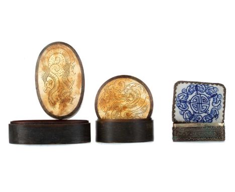 TWO CHINESE TORTOISESHELL BOXES,the lids carved with dragons, along with a white metal box, the lid inset with ceramic panel 