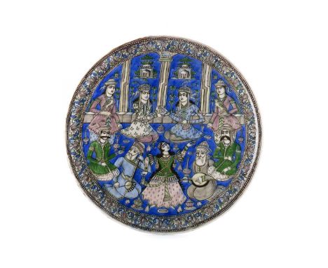 LARGE QAJAR POTTERY CIRCULAR TILE,second half of the 19th century, decorated in polychrome enamels on a cobalt ground with mu