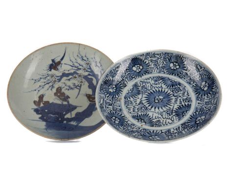 THREE CHINESE BLUE AND WHITE PLATES,the first decorated with magpies amongst a prunus tree, 28cm diameter, an early 19th cent