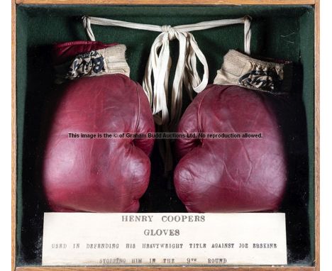 The boxing gloves worn by Henry Cooper when defending his heavyweight title against Joe Erskine, a pair of red Baily's of Gla