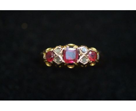 9ct gold ring set with ruby and diamonds, size- N