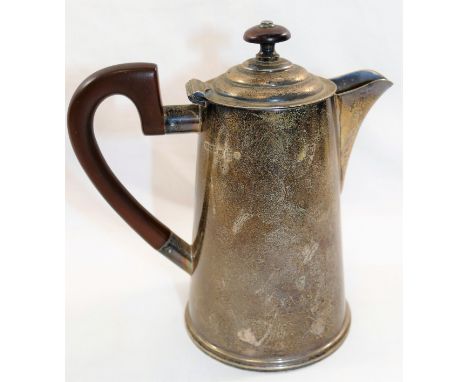 A George V silver hot water jug, Sheffield 1934 by James Dixon and Son, of plain tapering form with bakelite handle and woode