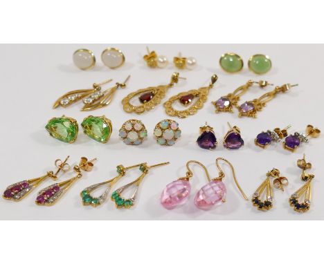 A pair of 9 carat gold opal cluster earrings, a pair of 9 carat gold amethyst and diamond drop earrings and 12 other pairs of