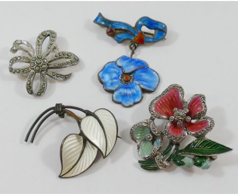 A Norweigan silver and white enamel leaf brooch, by Albert Scharning, a blue and red enamel brooch in the form of a flower he