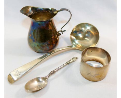 A small 20th century silver cream jug, marks rubbed, 7.5cm high, a Victorian silver fiddle pattern ladle, London 1850, a silv