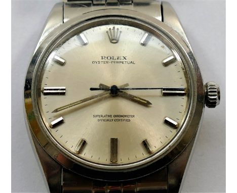 A Rolex Oyster-Perpetual gentleman's wrist watch, the silvered dial with baton numerals and  inscribed 'Superlative Chronomet