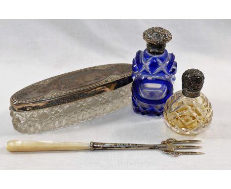 A Victorian blue flashed cut glass scent bottle, with silver hinged lid and collar, 7cm high, a small clear cut glass scent b