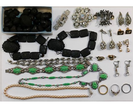 Two Victorian pressed horn panel bracelets, a collection of carved bog oak acorn beads and a larger acorn pendant, and a smal