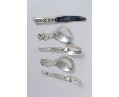 A GEORG JENSEN STERLING SILVER KNIFE, FORK AND SPOON and a pair of similar spoons (5).