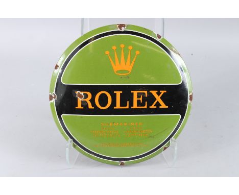 A ROLEX GREEN CIRCULAR ENAMEL SIGN. 11.5ins diameter.