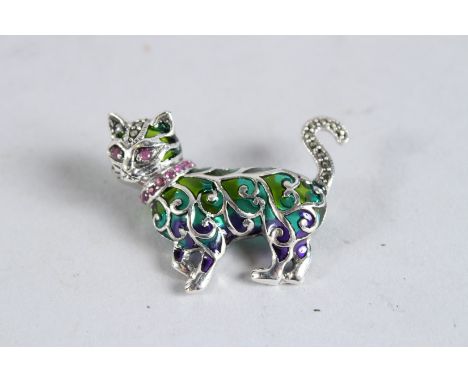 A SILVER AND RUBY COLLAR AND EYE PLIQUE ENAMEL CAT BROOCH.