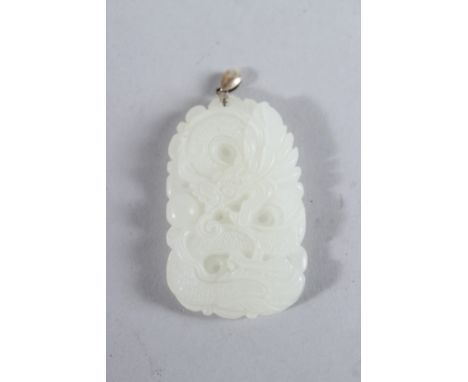 A SILVER TOP CHINESE WHITE JADE PENDANT.
