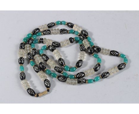 A JADE AND CRYSTAL NECKLACE. 38ins long.
