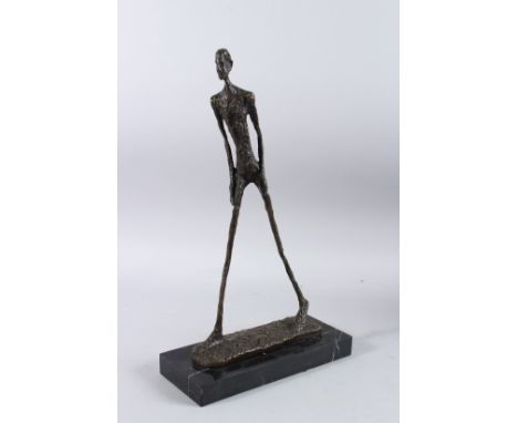 AFTER A. GIACOMETTI (1901 - 1966) SWISS. A BRONZE STICK MAN on a marble base. 17.5ins high.