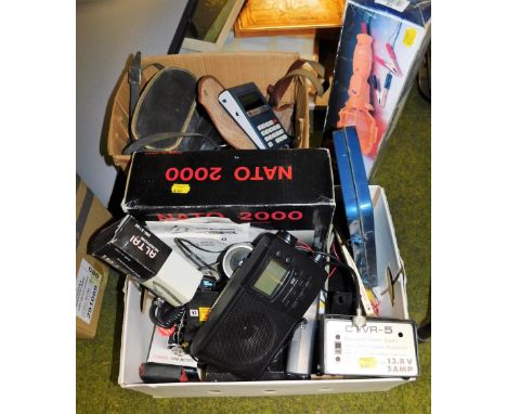 Cased binoculars, a Brownie Twin 20 camera, Sharp LCELISI8002 calculator, an auto inspection lamp, Airband radio, realistic 1