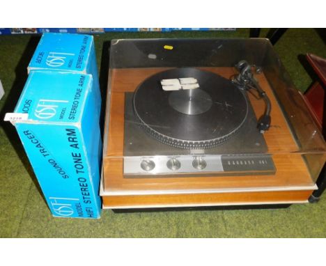 A Garrard 401 tabletop record player, and two boxed Acos stereo tone arms. 