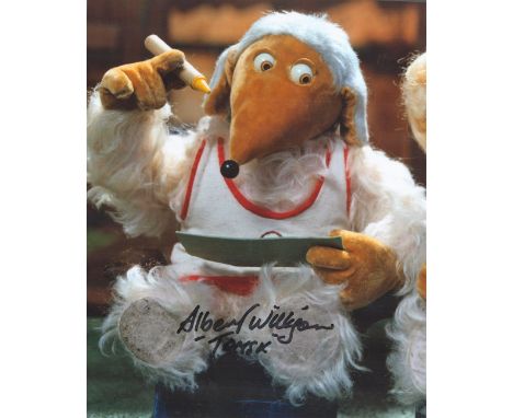 Albert Wilkinson signed 10x8 Womble coloured photo. Good condition. All autographs come with a Certificate of Authenticity. W