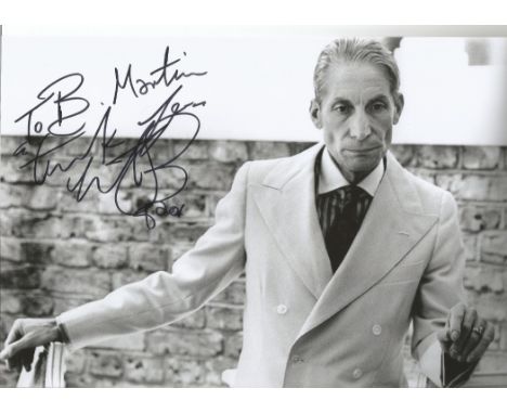 Charlie Watts was the famous musician who played the drums in the rock band The Rolling Stones. Signed 12x8 black and white p