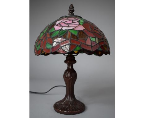 A Reproduction Bronze Effect Table Lamp with Tiffany Style Shade, 35cm high 