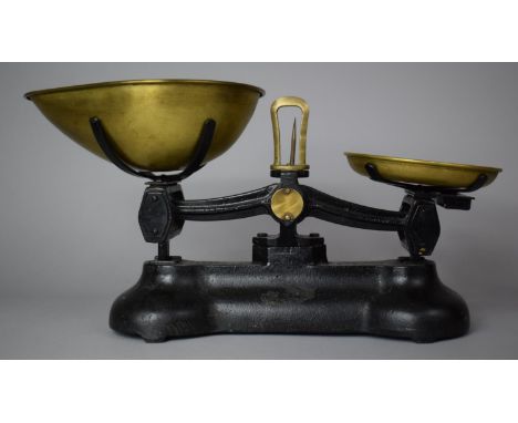 A Pair of Libra Cast Iron Kitchen Scales with Brass Pans 
