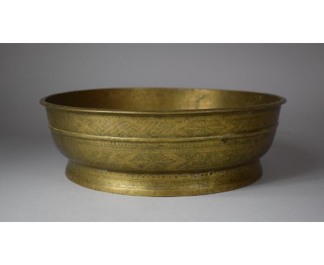 A Circular Indian Bronze Bowl, the Sides Intricately Engraved with Leaves and Geometric Patterns, 31cm Diameter 