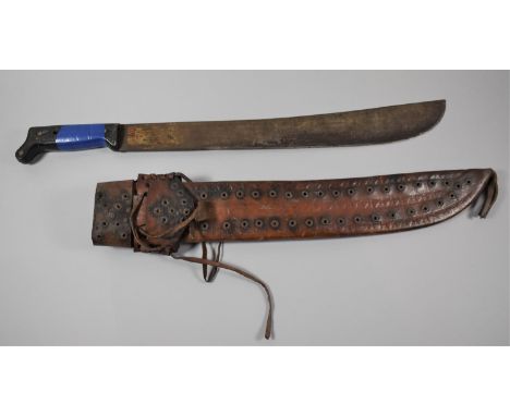 A Mid 20th Century South American Machete in Leather Scabbard, Blade Stamped Columbia 