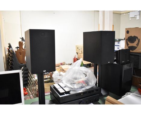 A Rotel Compact Disk Player and Amplifier Together with a Pair of B&amp;W Speakers, 685-100W on Stands 