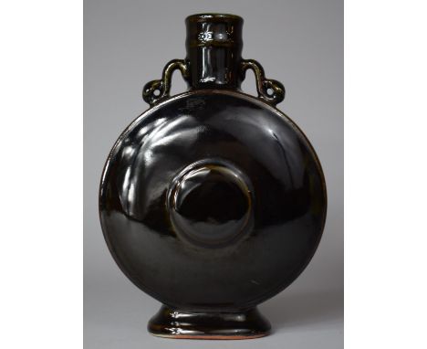 A Chinese Black Glazed Moonflask with Six Character Kangxi Mark to Base, 24cm high 