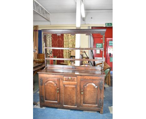 A 19th Century Oak Dresser with Small Centre Drawer and Panelled Doors with Iron H Hinges Either Side, Raised Two Shelf Plate