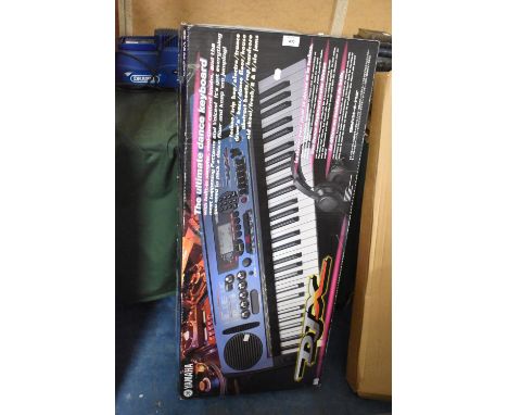 A Yamaha DJX-K Keyboard, Complete with Stand 