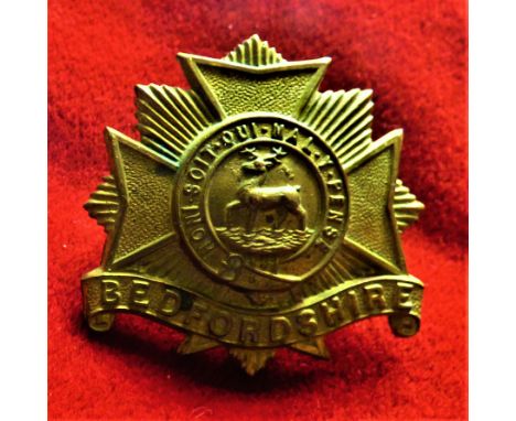 Bedfordshire Regiment WWI War Economy Forage Cap Badge (Brass), two lugs. K&amp;K: 610