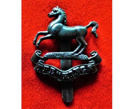 The King's (Liverpool Regiment) 5th Battalion Territorial Cap Badge (Blackened-brass), slider, issued between 1908-1921. K&am