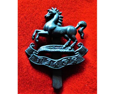 The King's (Liverpool Regiment) 5th Battalion Territorial Cap Badge (Blackened-brass), slider and with the word "King's" in o