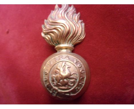 The Northumberland Fusiliers Regiment Other Ranks Head Dress Badge for the Racoon-skin cap, (Brass) two lugs, K&amp;K: 945.