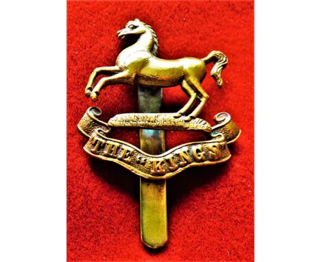 The King's (Liverpool Regiment) War Economy Cap Badge (Gilding-metal), slider, issued between 1898-1926. K&amp;K: 598