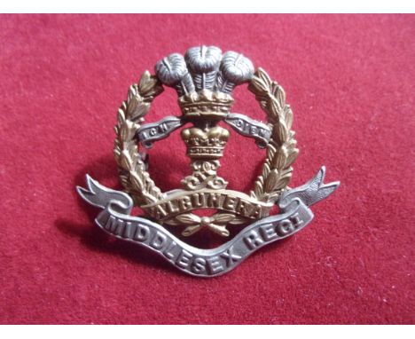 The of Cambridge's Own (Middlesex Regiment) WWI Forage Cap Badge (Bi-metal), two lugs. K&amp;K: 672