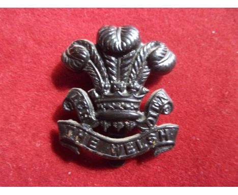 7th (Cyclist) Battalion, The Welsh Regiment WWI Cap Badge (Blackened-brass), slider. K&amp;K: 1865