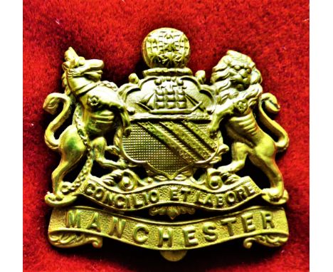 Manchester Regiment WWI War Economy Cap Badge (Bi-metal), slider and made Lambourne &amp; Co, Birmingham. K&amp;K: 677