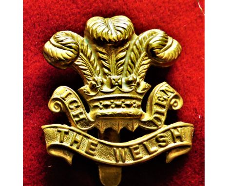 The Welsh Regiment WWI War Economy Cap Badge (Gilding-metal), Slider. K&amp;K: 653