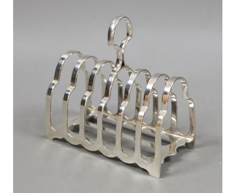 A George V silver seven bar toast rack, George Howson, Sheffield, 1926, length 13cm, 7.7oz.