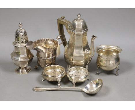 A George V silver octagonal hot water pot, a.f. and six other items of small silver including pair of salts, caster, cream ju