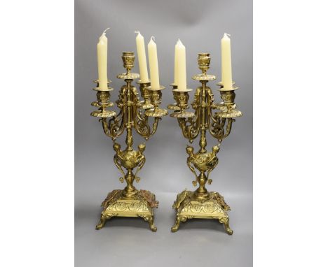 A pair of ormolu five light candelabra,49cms high