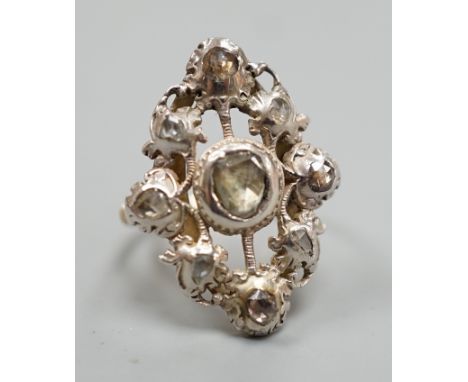 A pierced yellow and white metal, rose cut diamond cluster set ring (adapted?), size K, gross weight 6.1 grams.