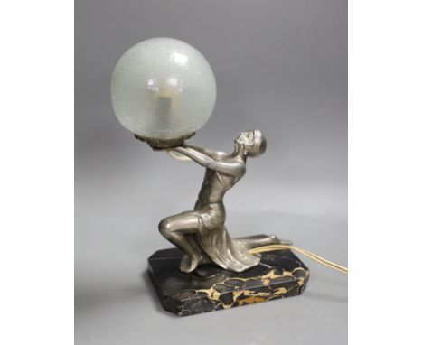 An Art Deco silvered metal figural lady lamp. 26cm high