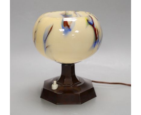 An Art Deco bakelite and glass lamp. 18cm high