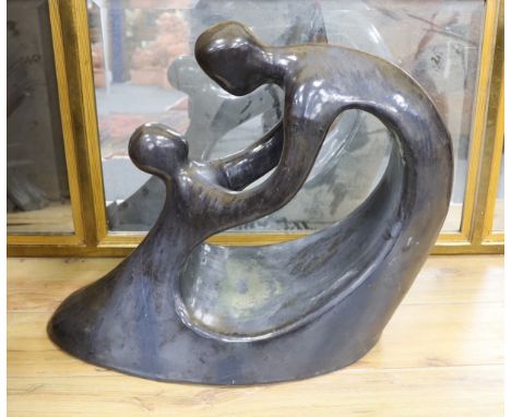 A silver lustred terracotta sculpture in the style of B. Hepworth,59cms high