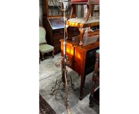An early 20th century brass telescopic standard lamp
