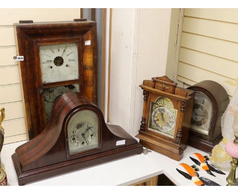 Two domed mantel clocks, a Connecticut  shelf clock and a Black Forest mantel clock